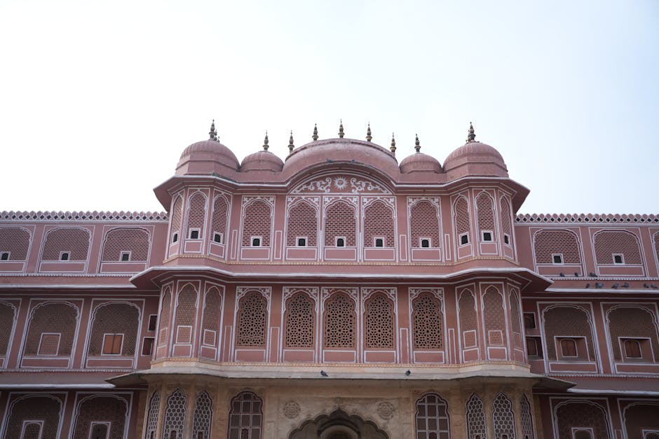 Front view of the iconic architecture of Jaipur Fort, showcasing detailed design and vibrant colors.