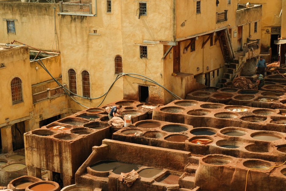 The bustling Chouara Tannery in Fes showcases traditional leather dyeing processes.